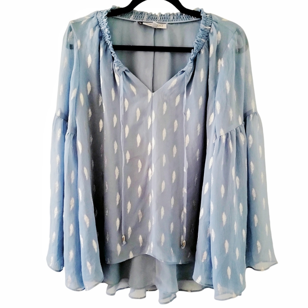Jennifer Lopez blue feather blouse